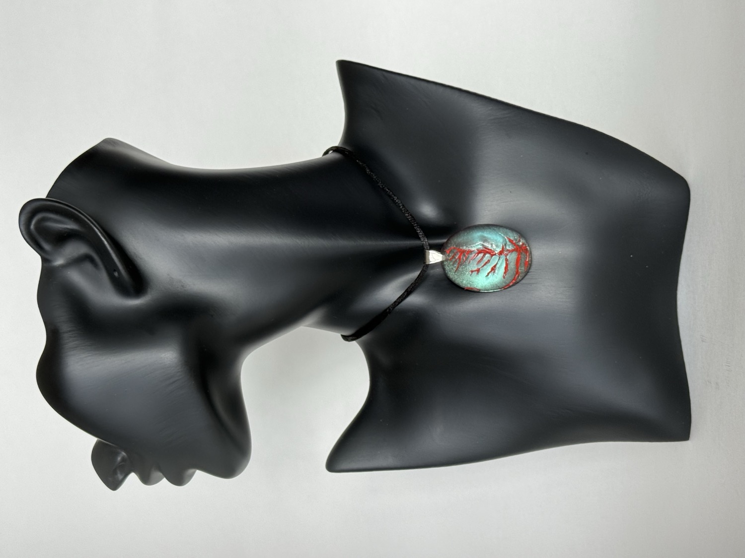 Teal and red branch pendant