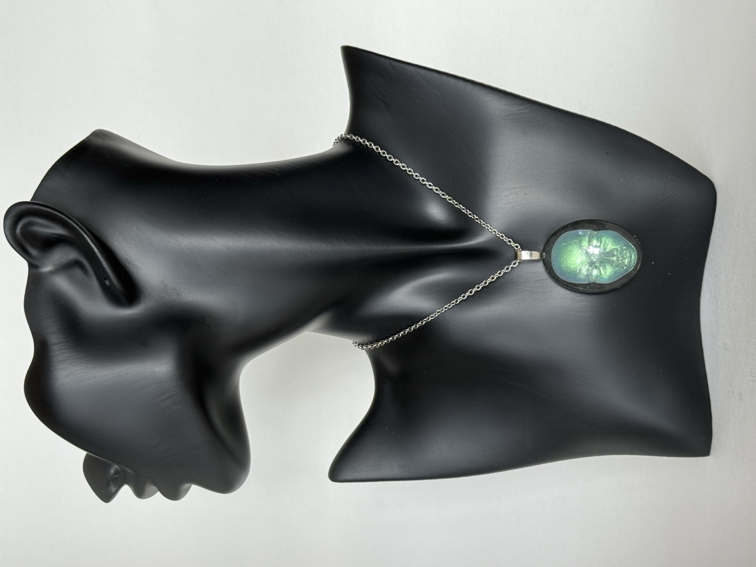 Dark green iridescent pendant