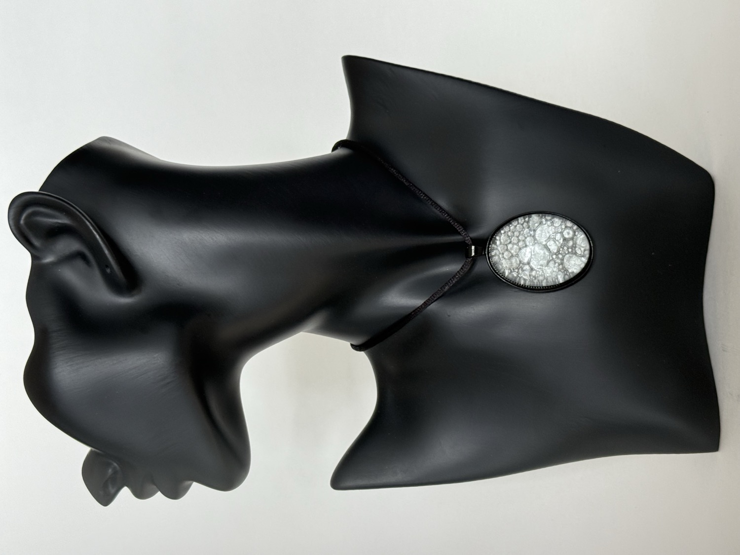 Silver and black bubble oval pendant