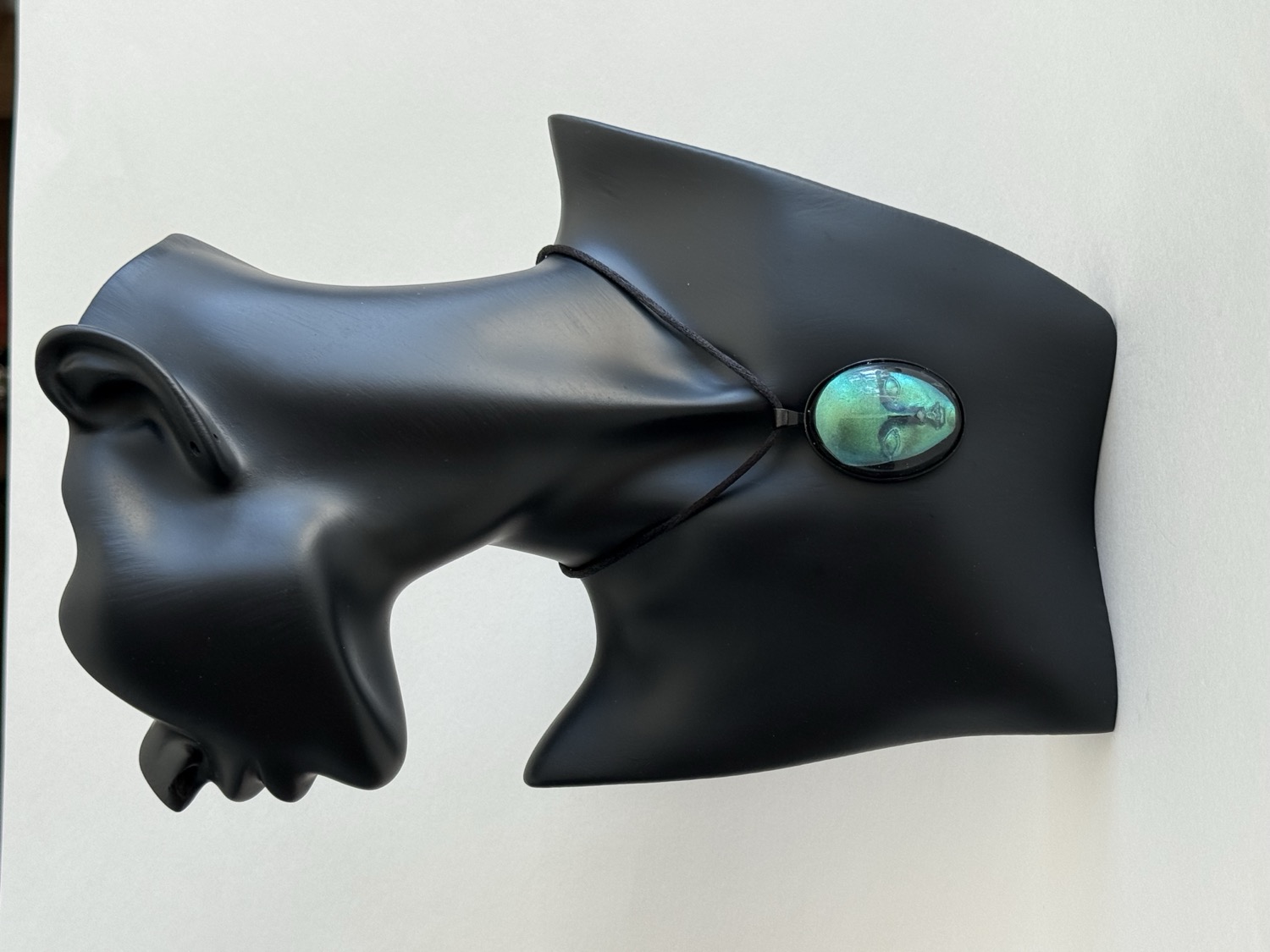 Teal iridescent oval pendant