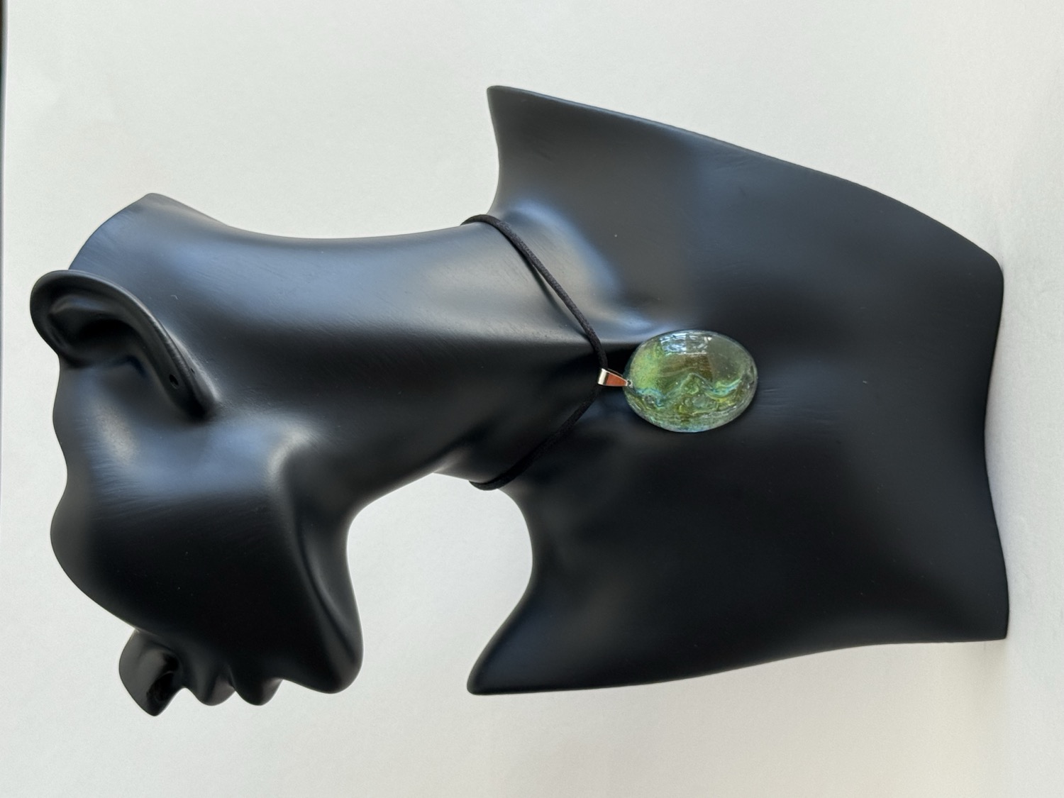 Large teal green oval pendant