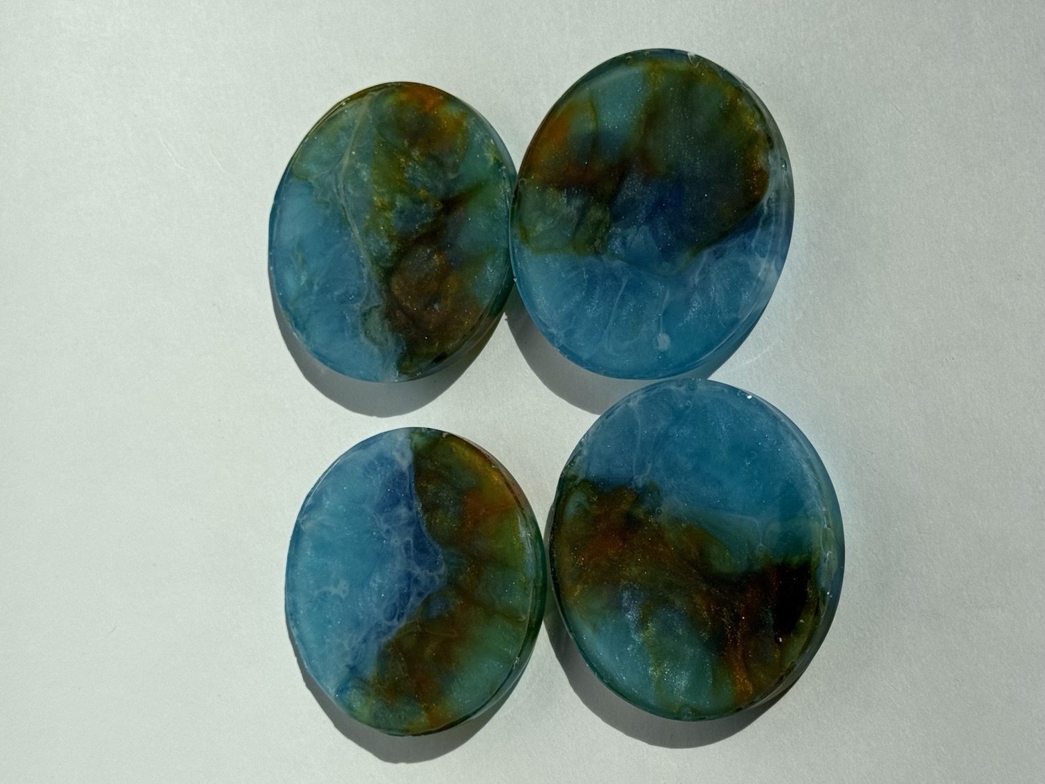 Blue green brown marble oval coaster set
