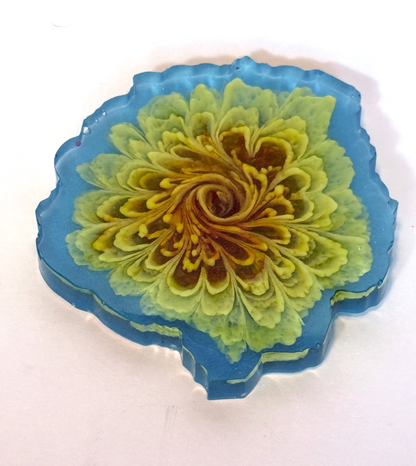 Teal marigold coaster view 2