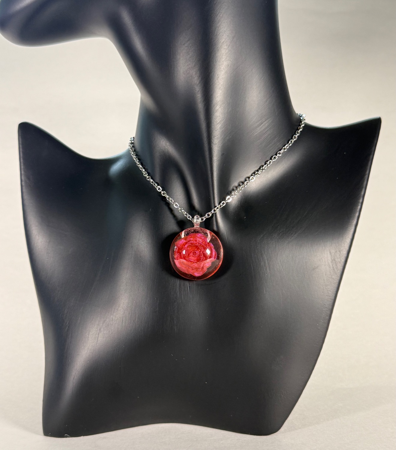 Encapsulated rose pendant view 4