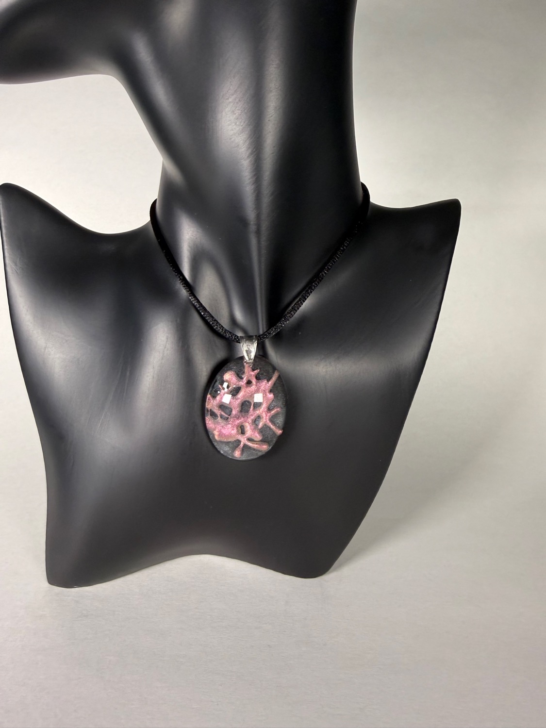 Dark coral branch oval view 2