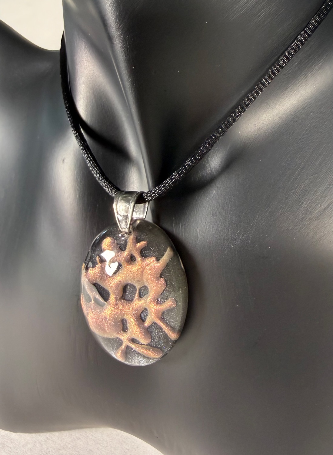 Dark coral branch oval view 3