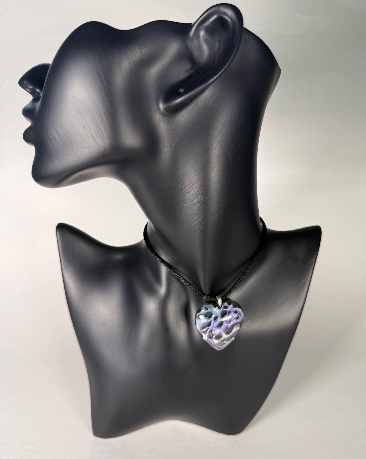 Silver void heart pendant