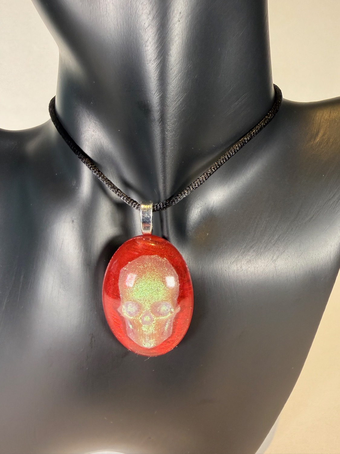 Glow skull pendant view 2