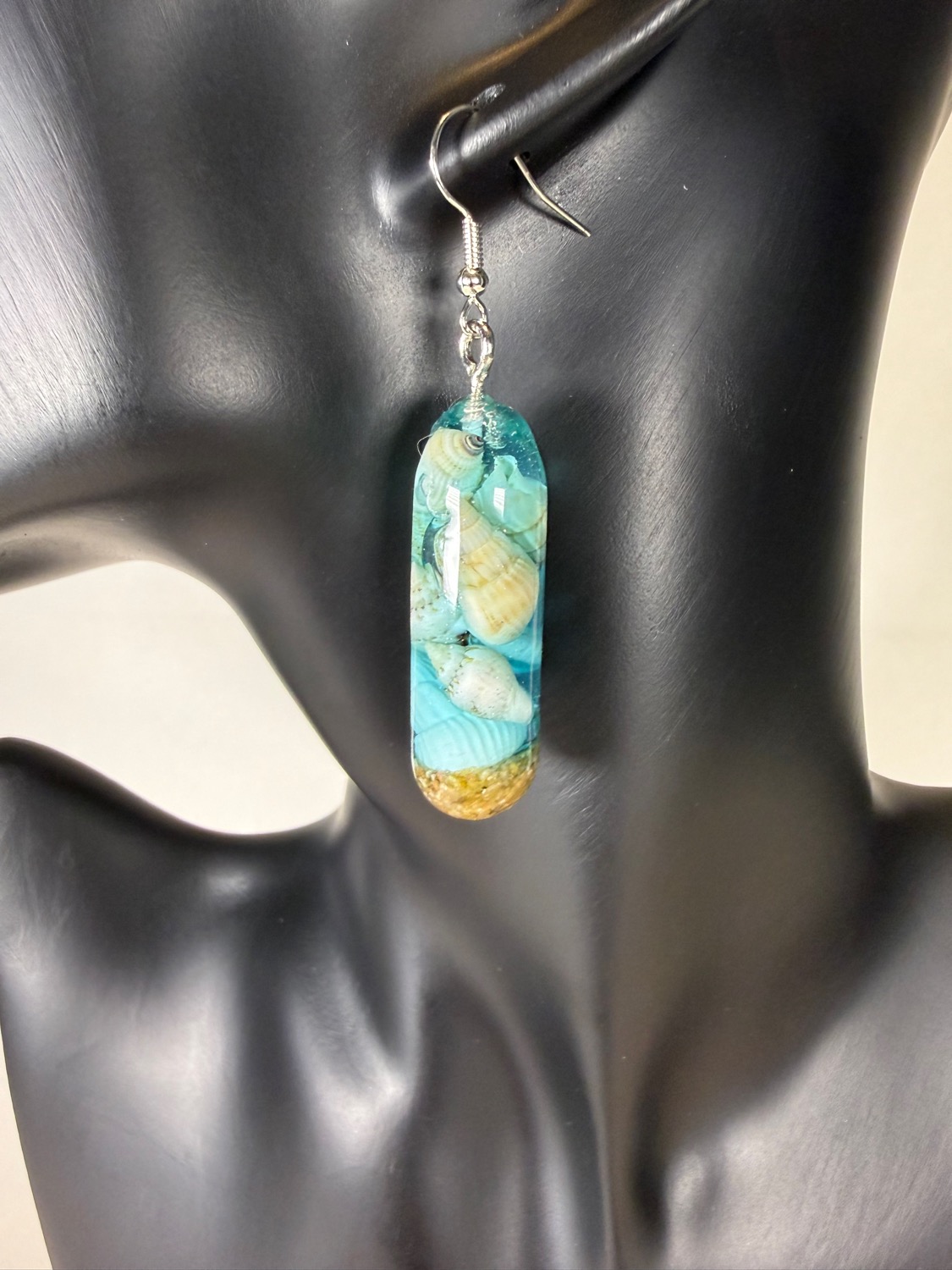 Seashell capsule earrings view 2