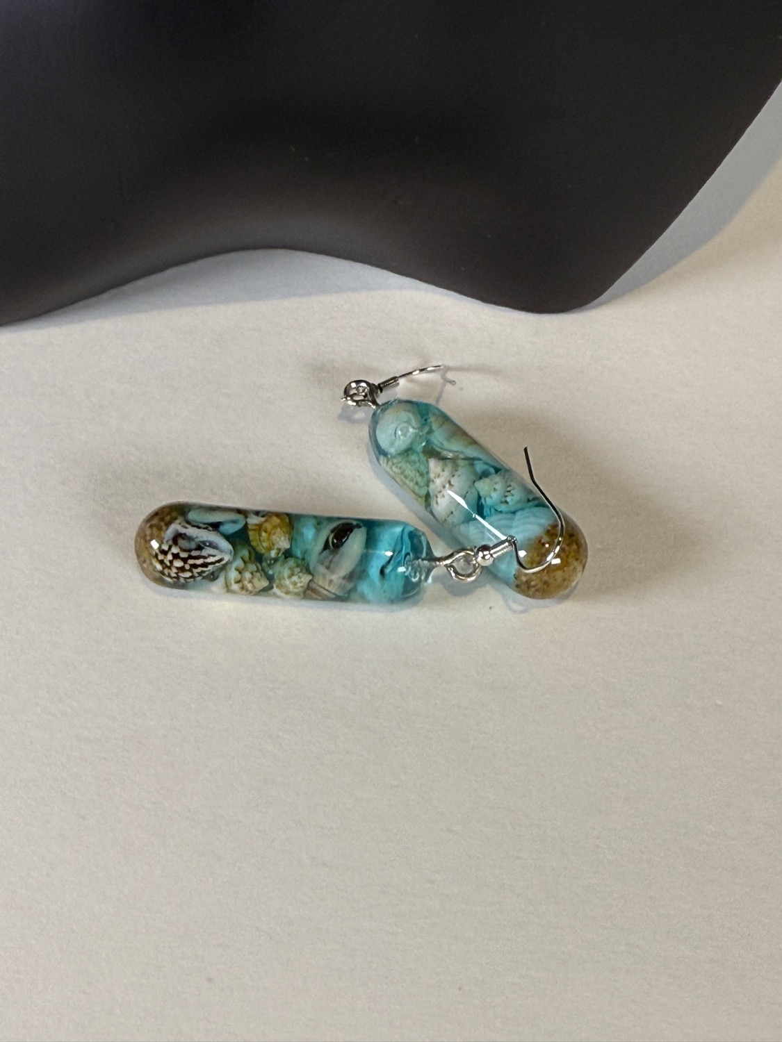 Seashell capsule earrings view 3