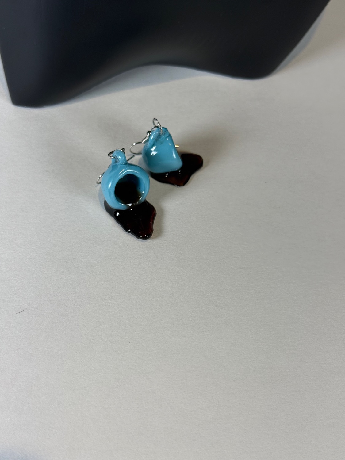 Spilled coffee earrings view 3