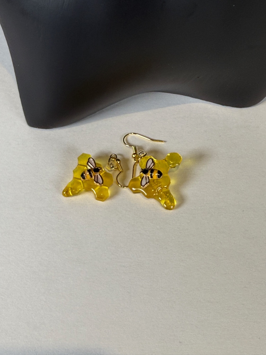 Gold flower earrings view 3