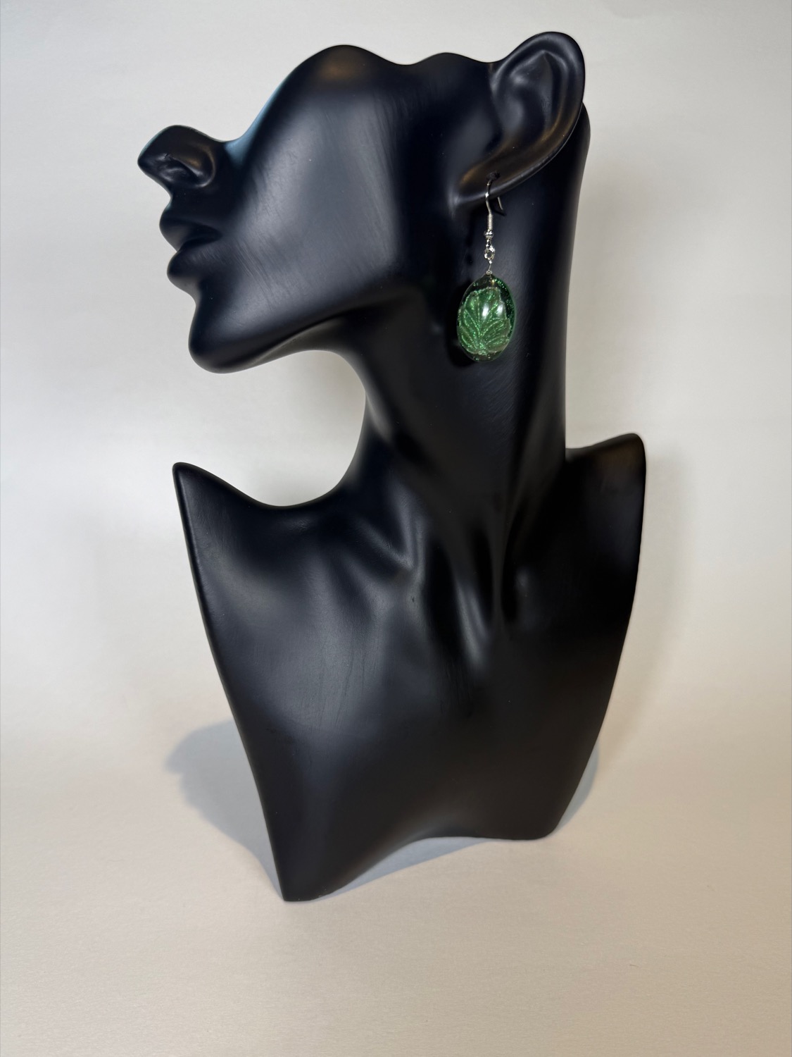Green sparkly leaf oval earrings
