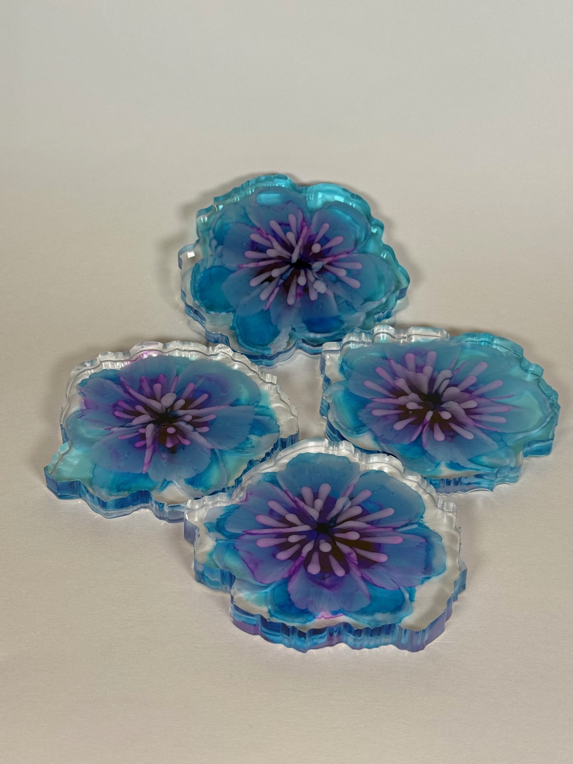 Blue teal flower coaster set with purple stamen