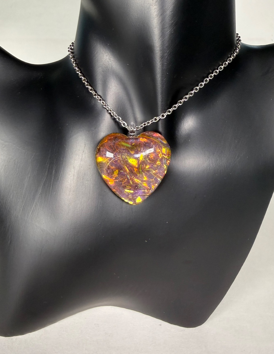 Amber heart pendant view 2