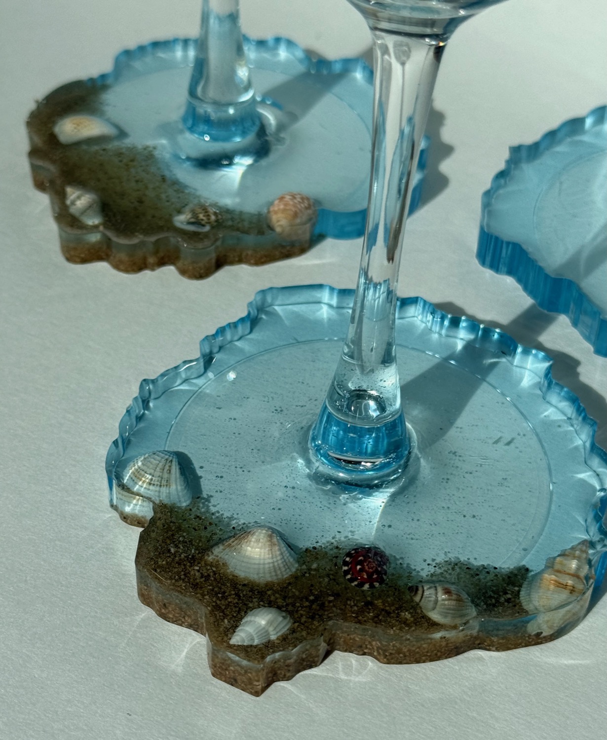 Wine on the beach glass coaster base close-up