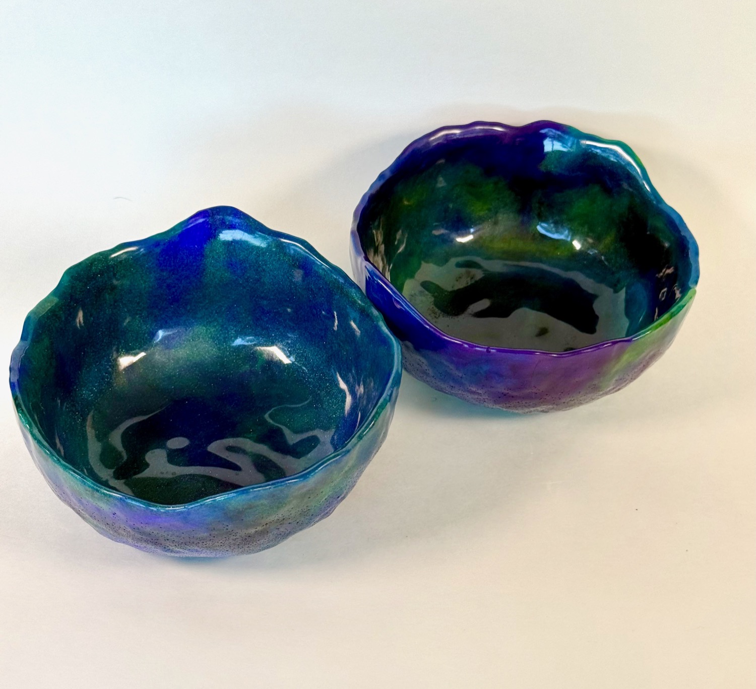 Northern Lights Bowl Set — pair of small resin bowls in teal and purple