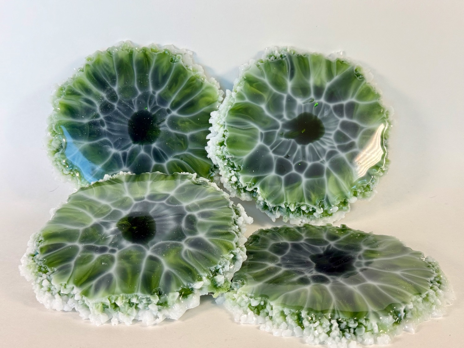 Set of 4 green geode resin coasters with crystal edges