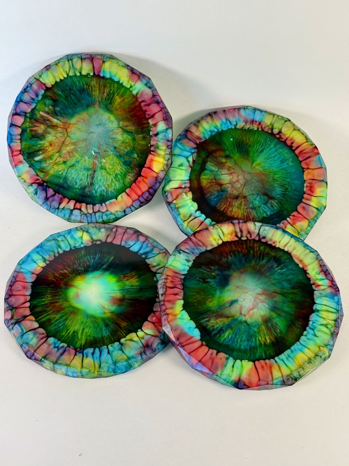 Set of 4 rainbow prism eye resin coasters with dark centre and explosion pattern