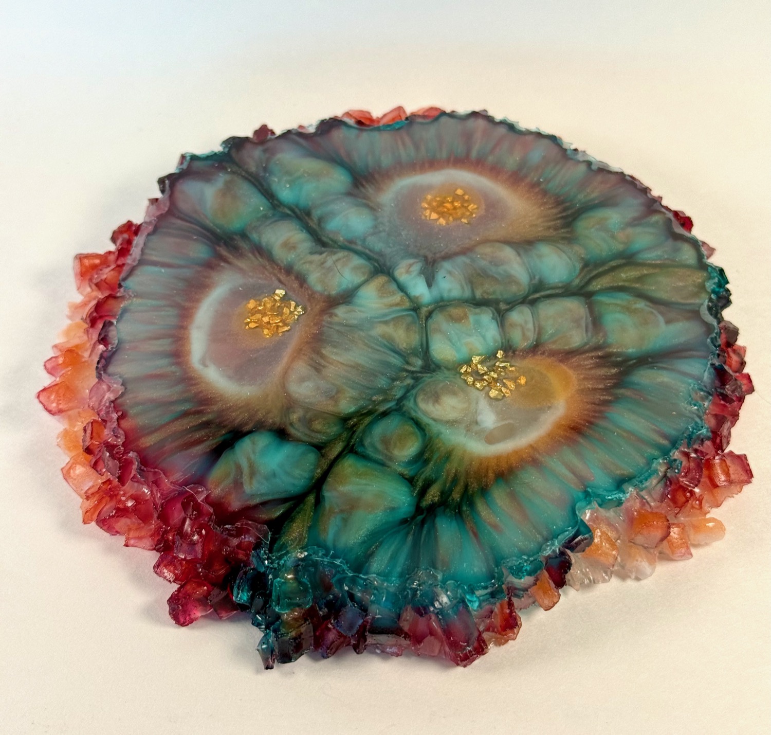 Coral Eye coaster angled view