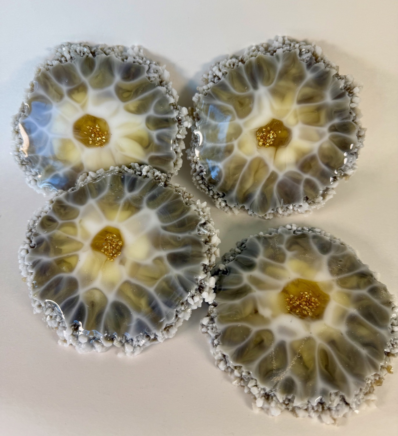 Set of 4 grey white honeycomb resin coasters with gold centre and white crystal edges