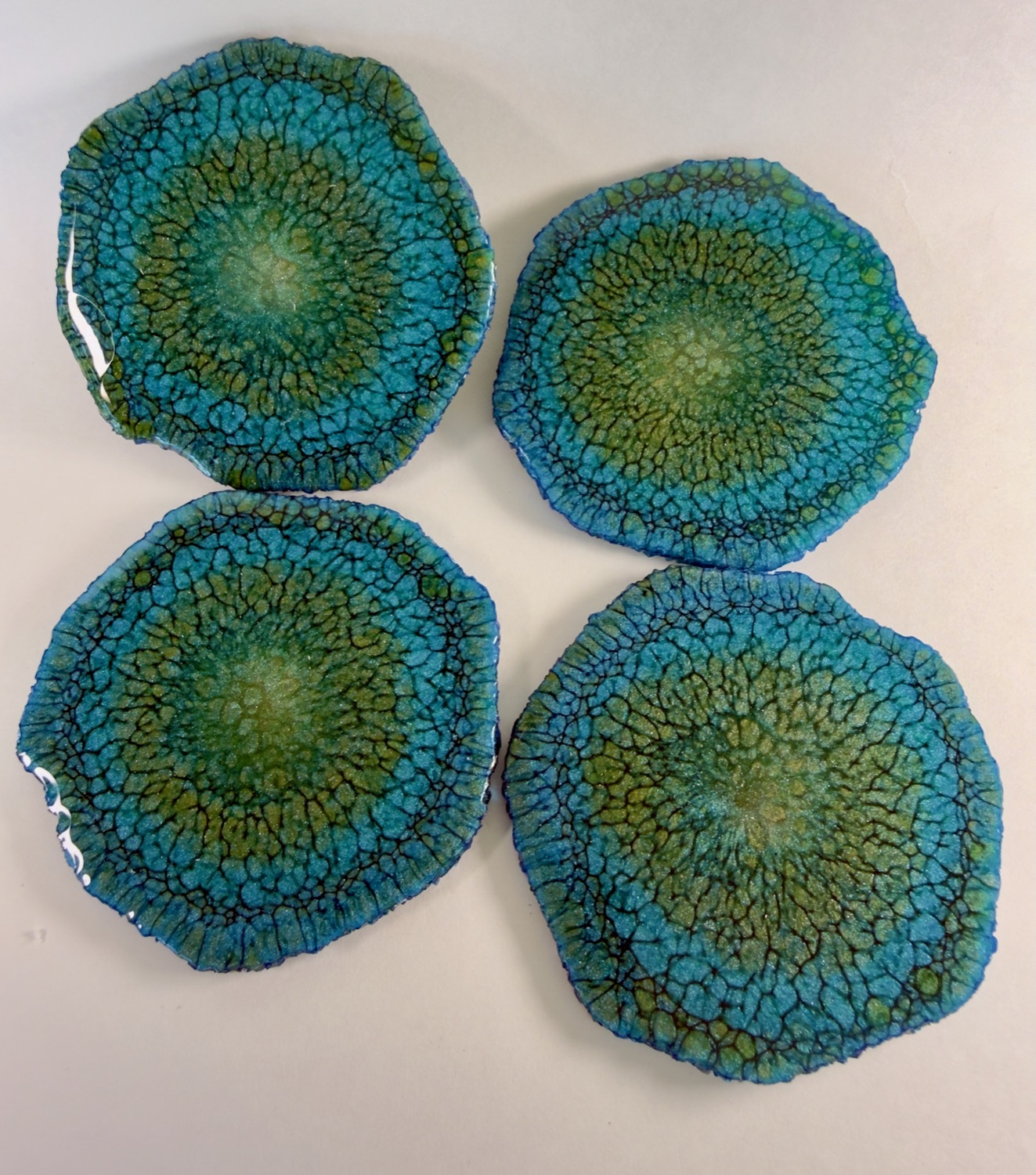 Set of 4 turquoise and green crackle geode resin coasters with fine cell web pattern
