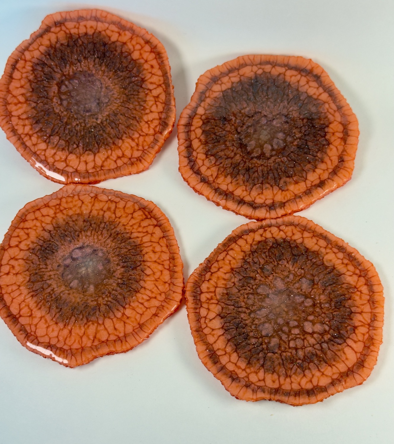 Set of 4 round terracotta and rust crackle geode resin coasters