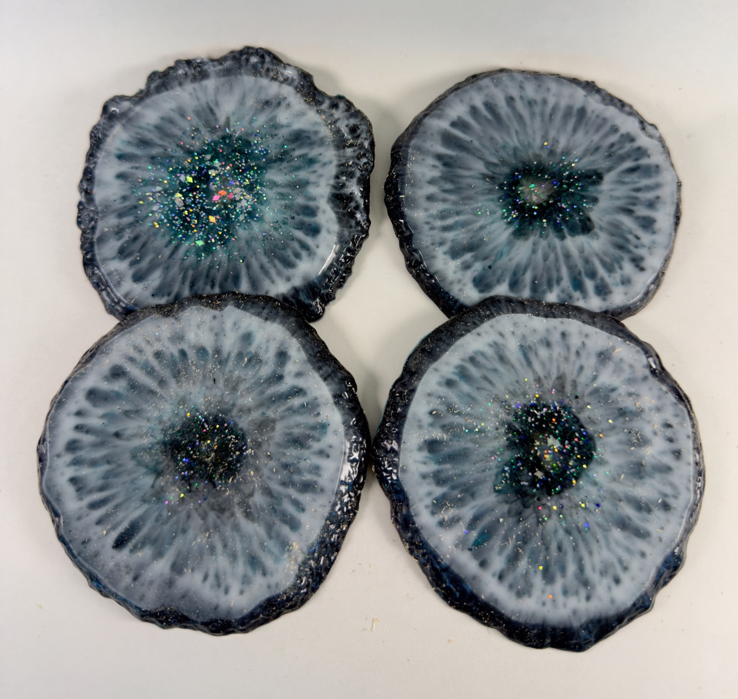 Set of 4 round black, grey and white geode resin coasters with silver druzy centres