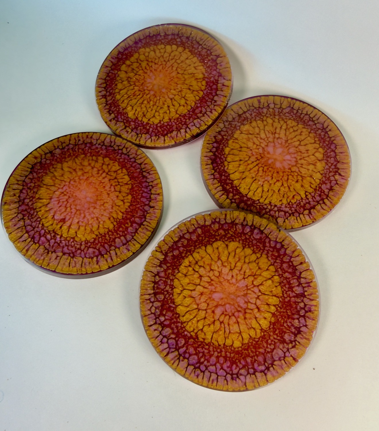Sunset Mandala coasters studio view