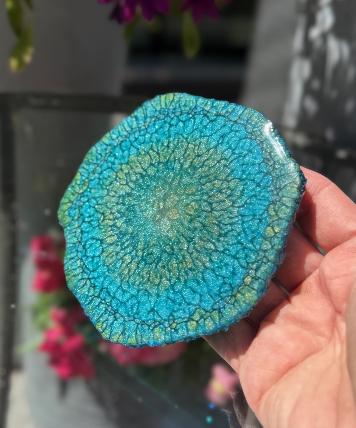Lagoon Geode coaster held in hand outdoors